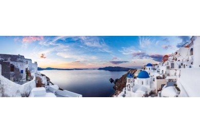 Вид Ия на Санторини в Греции на рассвете с небом