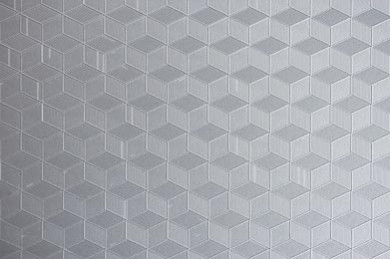 Текстурированный ромб на фоне металлической текстуры