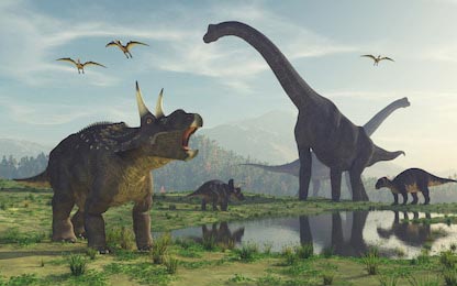 Динозавры пьющие воду у реки возле гор