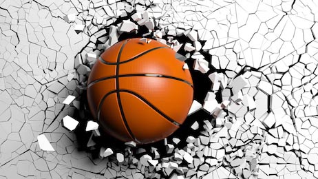 Баскетбольный мяч прорывается сквозь белую стену