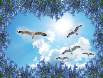 Чайки в голубом небе на фоне фиолетовых листьев