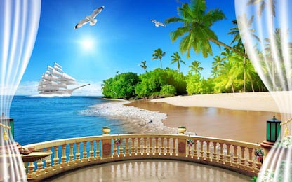 Вид с балкона на песочный пляж и голубой океан