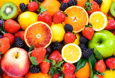 Спелые яркие фрукты как фон крупным планом